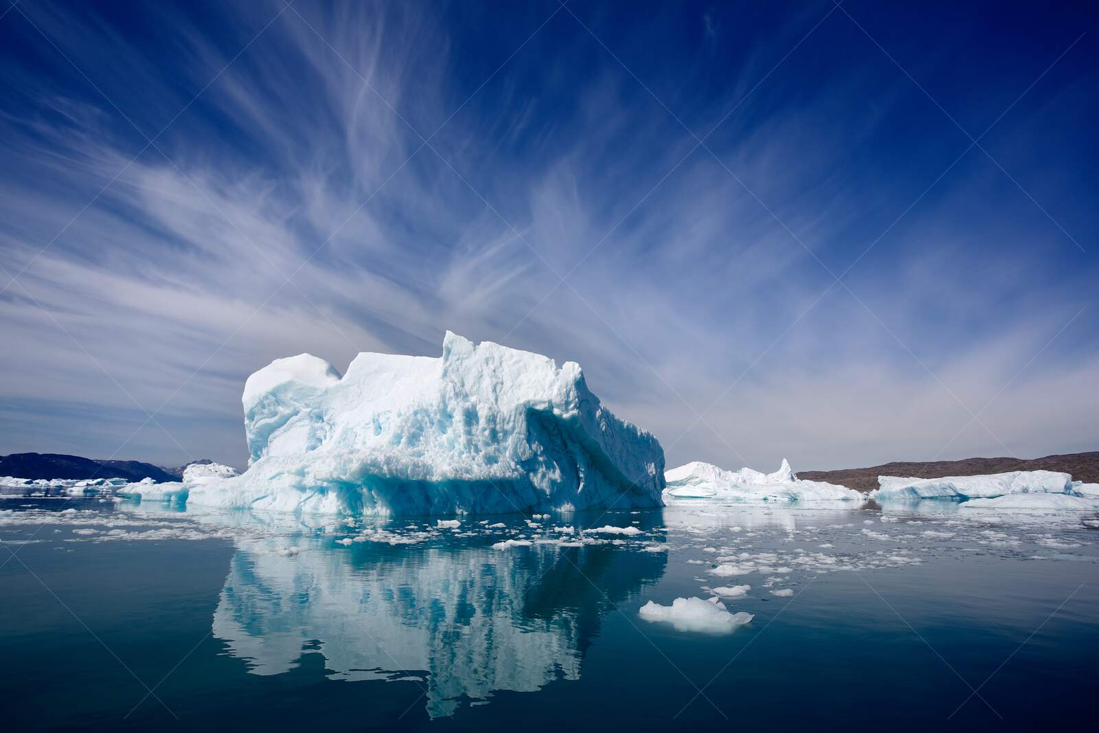 Majestic Iceberg Floating in Arctic Waters