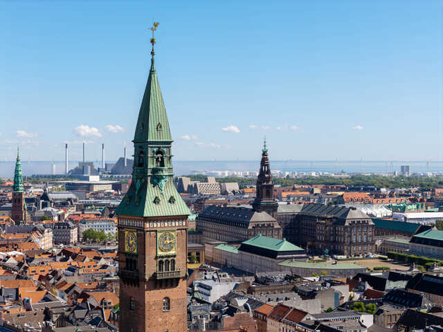 Historic Clock Tower Overlooking Copenhagen Cityscape