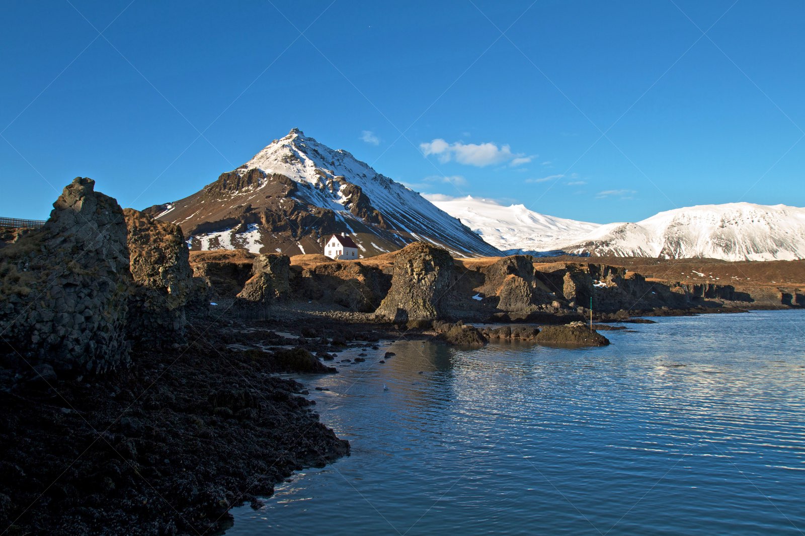 Arnarstapi coastal cliffs with the famously photogenic house