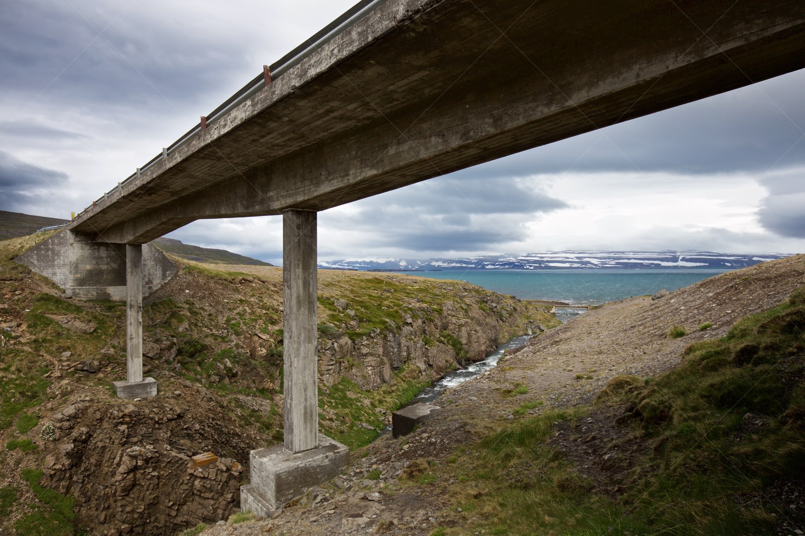 Djúpvegur Concrete Bridge over Rocky Stream in Iceland