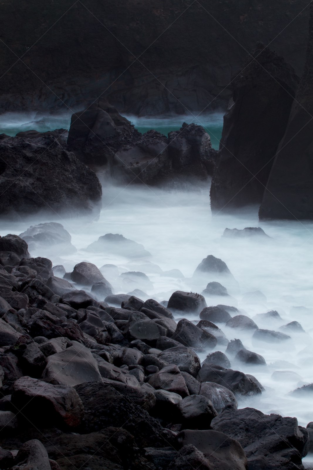 Misty rocky shoreline at Reykjanestá Iceland