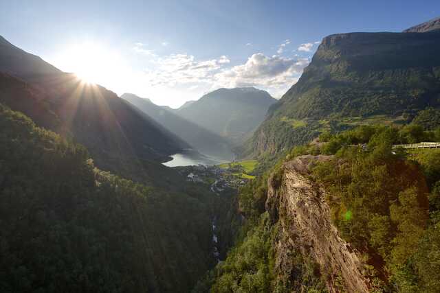 Sunset over Geiranger Fjord and surrounding mountains Norway