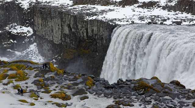 Dettifoss waterfall in Iceland with snowy cliffs