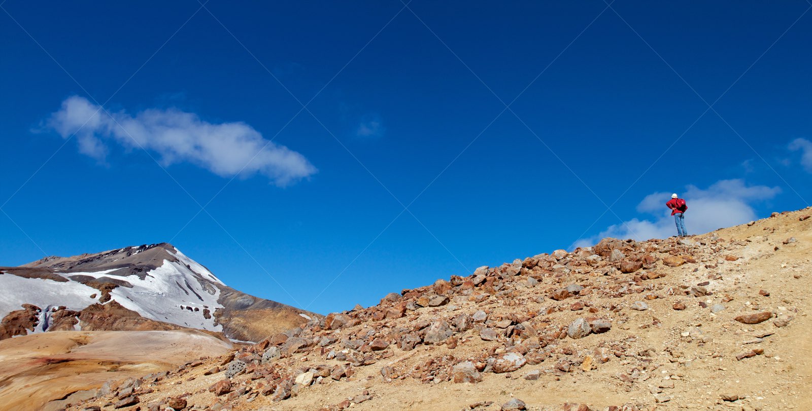 Hiker on rocky slope at Kerlingarfjöll Iceland