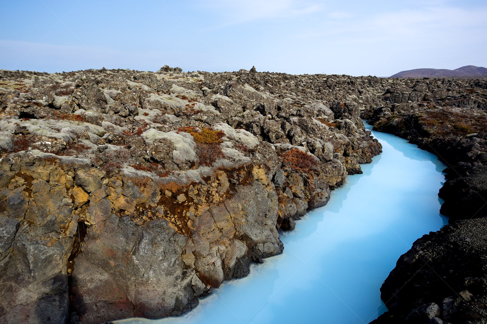 Milky Blue Water in Volcanic Landscape