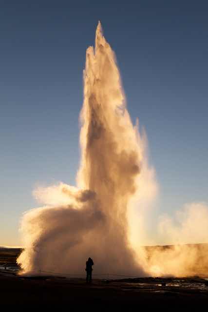 Geysir Eruption in Bláskógabyggð Iceland at Sunset