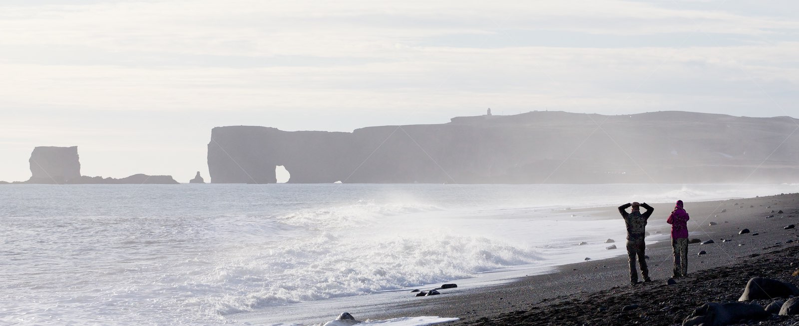 Reynisfjara Black Sand Beach with Basalt Sea Arch in Iceland