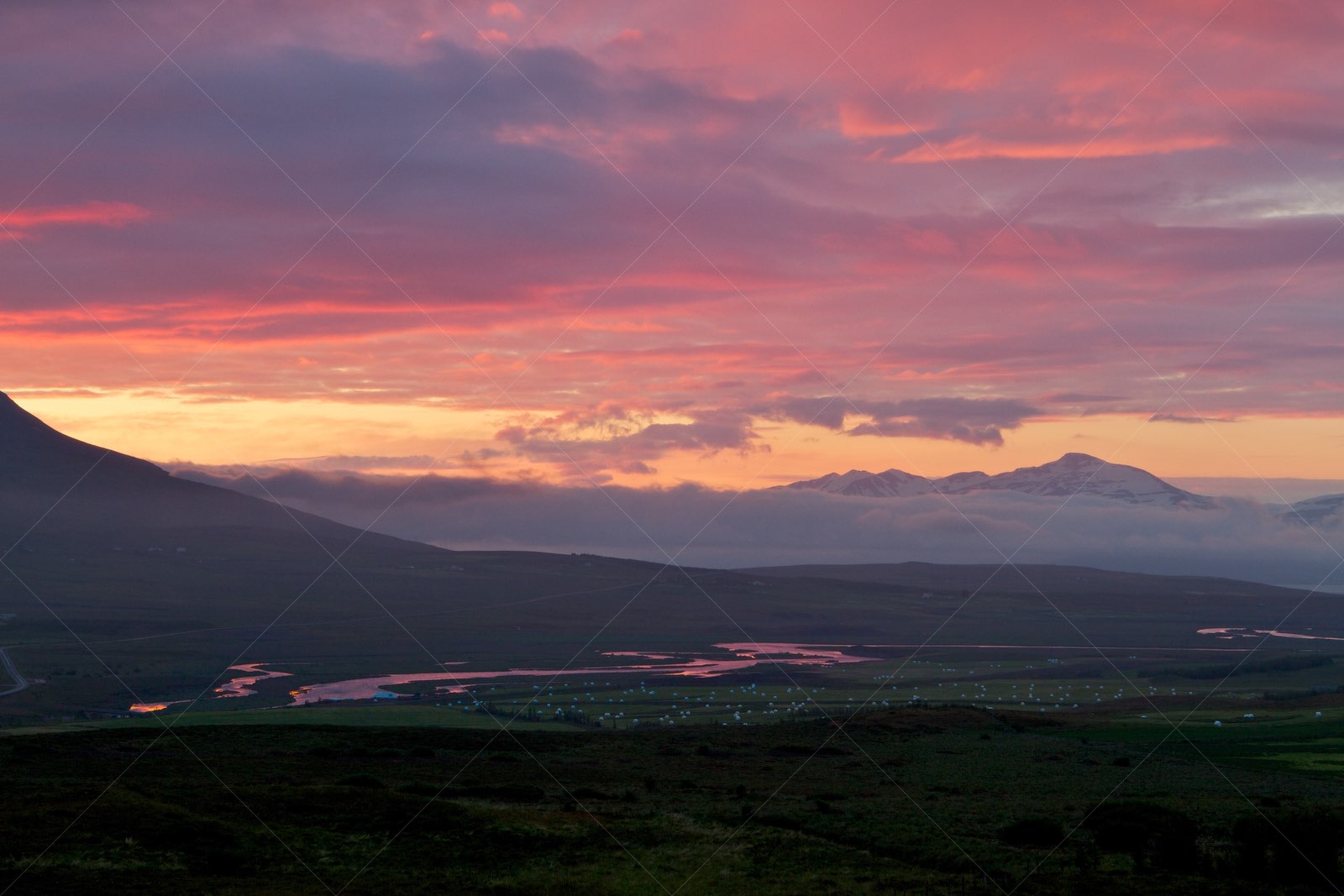 Sunset over Hörgársveit Farmland with Mountains