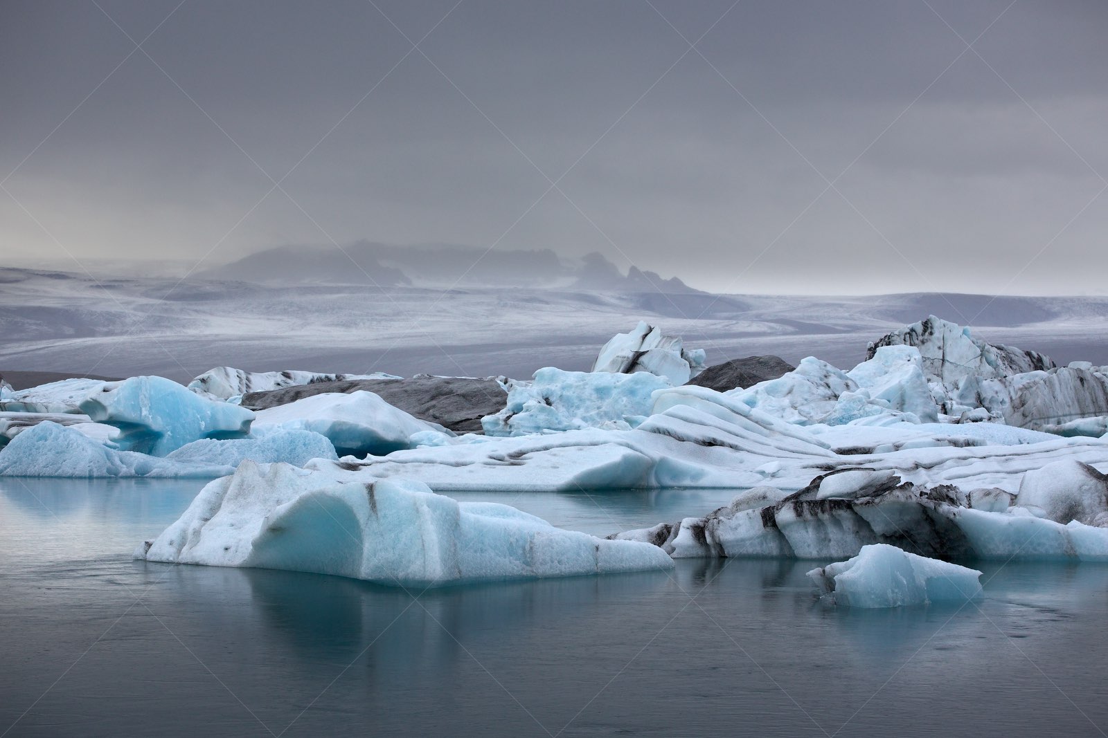 Icebergs floating in Jökulsárlón glacier lagoon Iceland