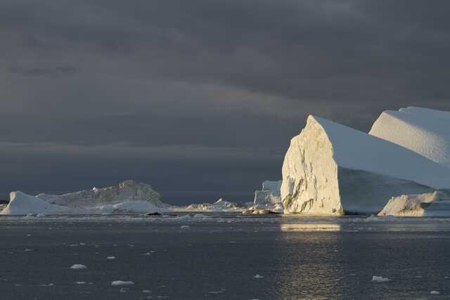 Iceberg in sunset