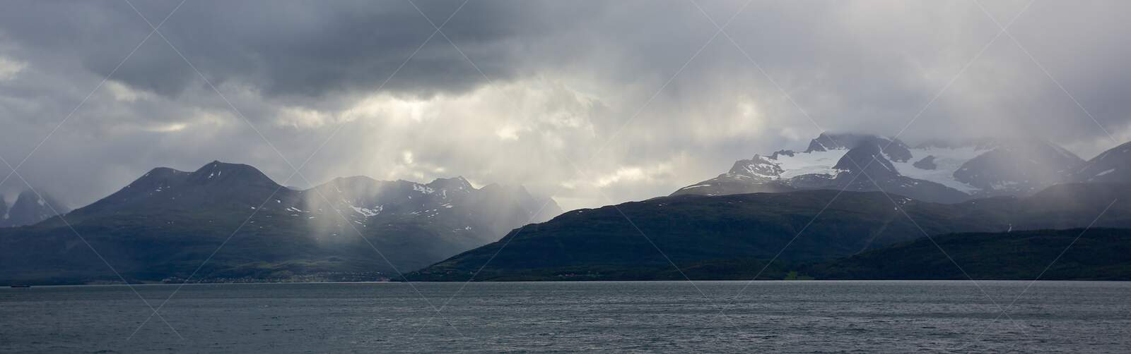 Moody mountain landscape with fjord in Kåfjord Norway