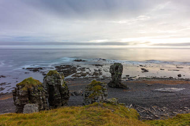 Rock formations on the coast of Westfjords Iceland at sunset