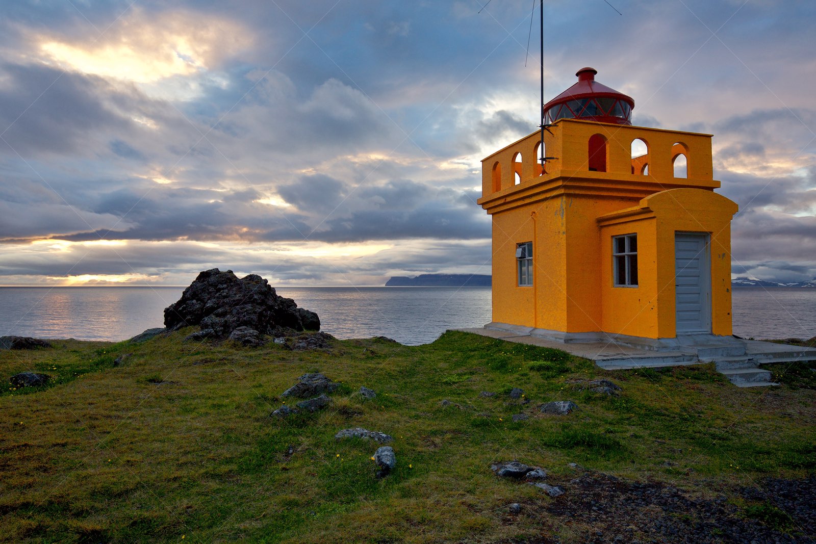 Bolungarvik Yellow Lighthouse at Sunset in Iceland