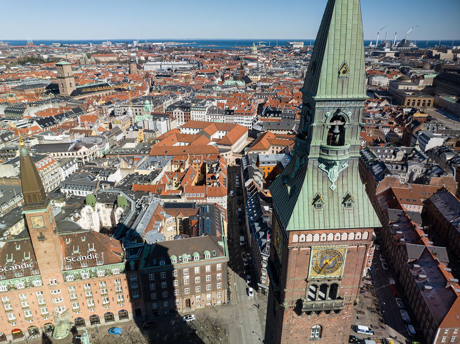 Rådhustårnet clock tower overlooking Copenhagen cityscape