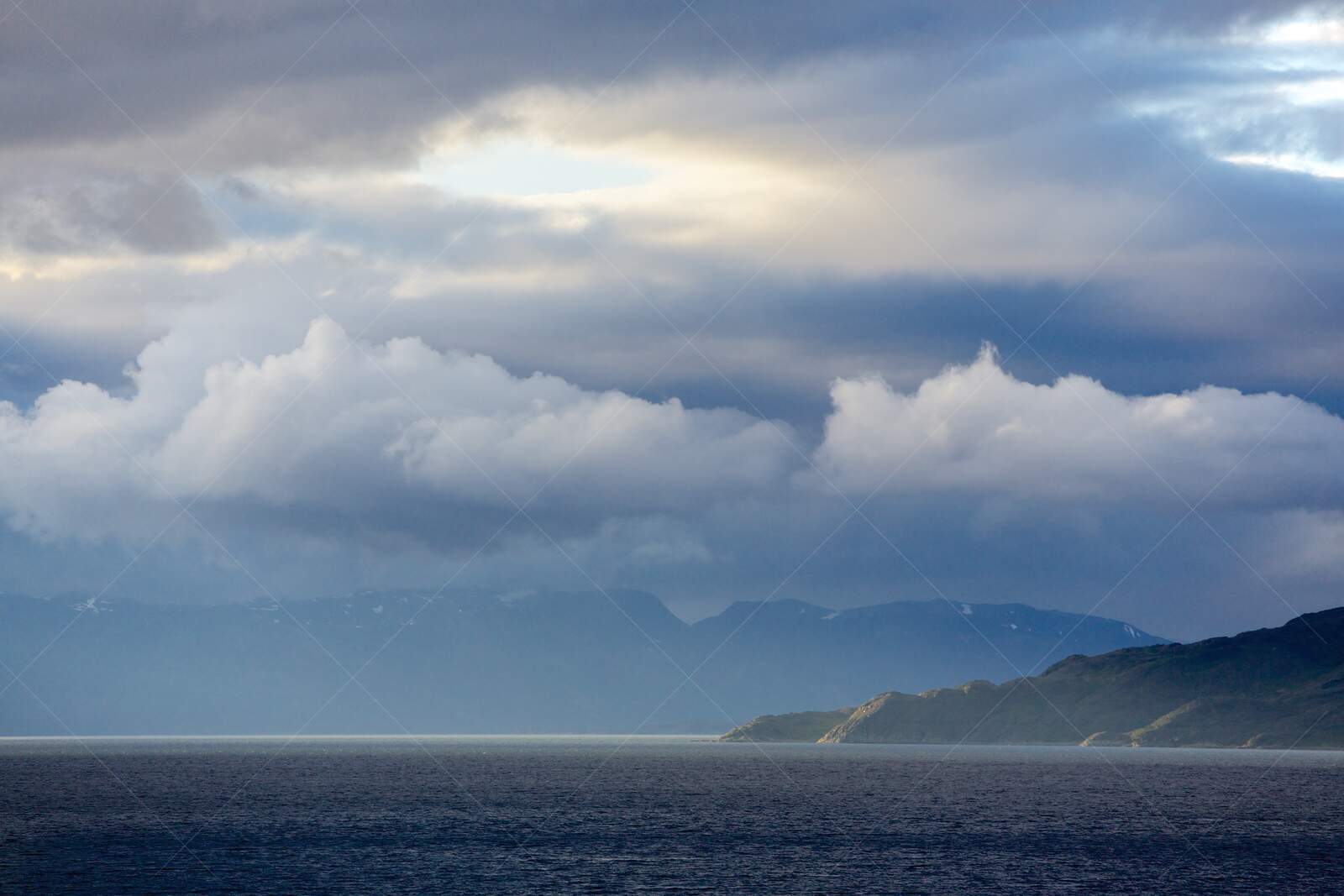 Coastal Landscape with Mountains and Dramatic Clouds in Alta Norway